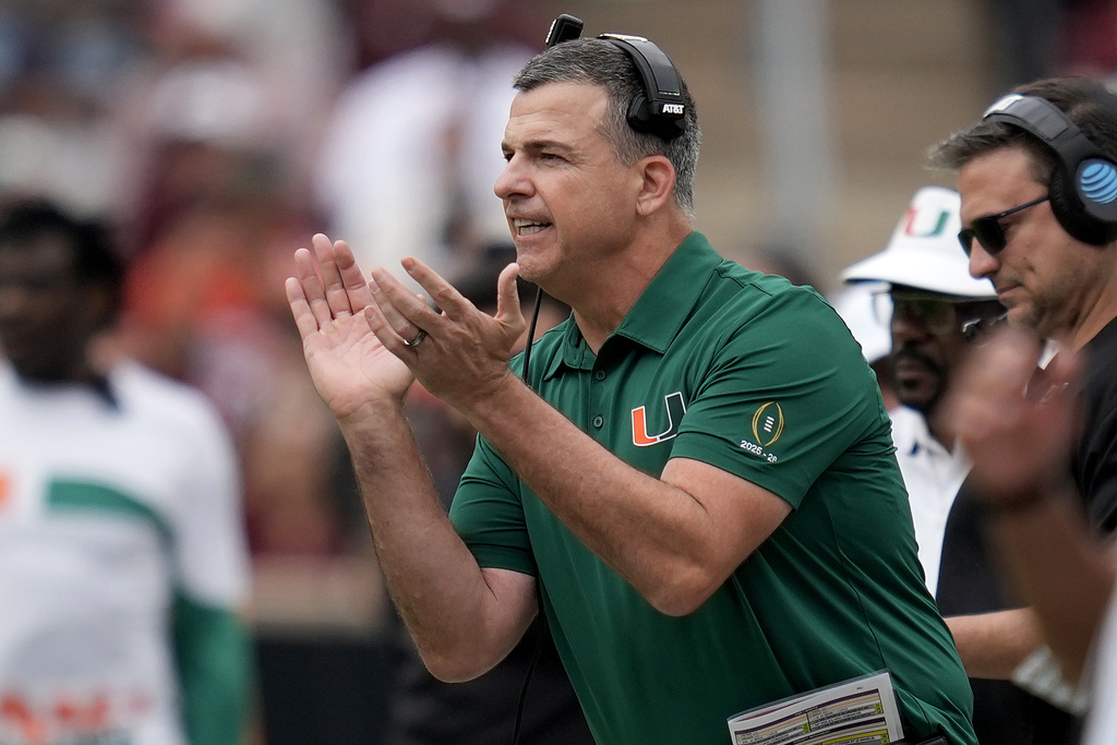 Miami head coach Mario Cristobal reacts to a play against Texas A&M during the first quarter in the first round of the NCAA College Football Playoff, Saturday, Dec. 20, 2025, in College Station, Texas. (AP Photo/Sam Craft)