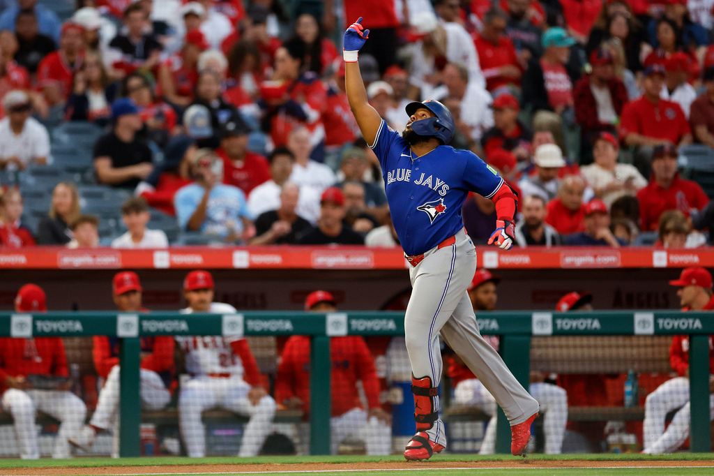Toronto Blue Jays' Vladimir Guerrero Jr. (27) rounds the bases after hitting a two-run home run during the third inning of a baseball game against the Los Angeles Angels, Monday, April 20, 2026, in Anaheim, Calif. (AP Photo/Caroline Brehman)