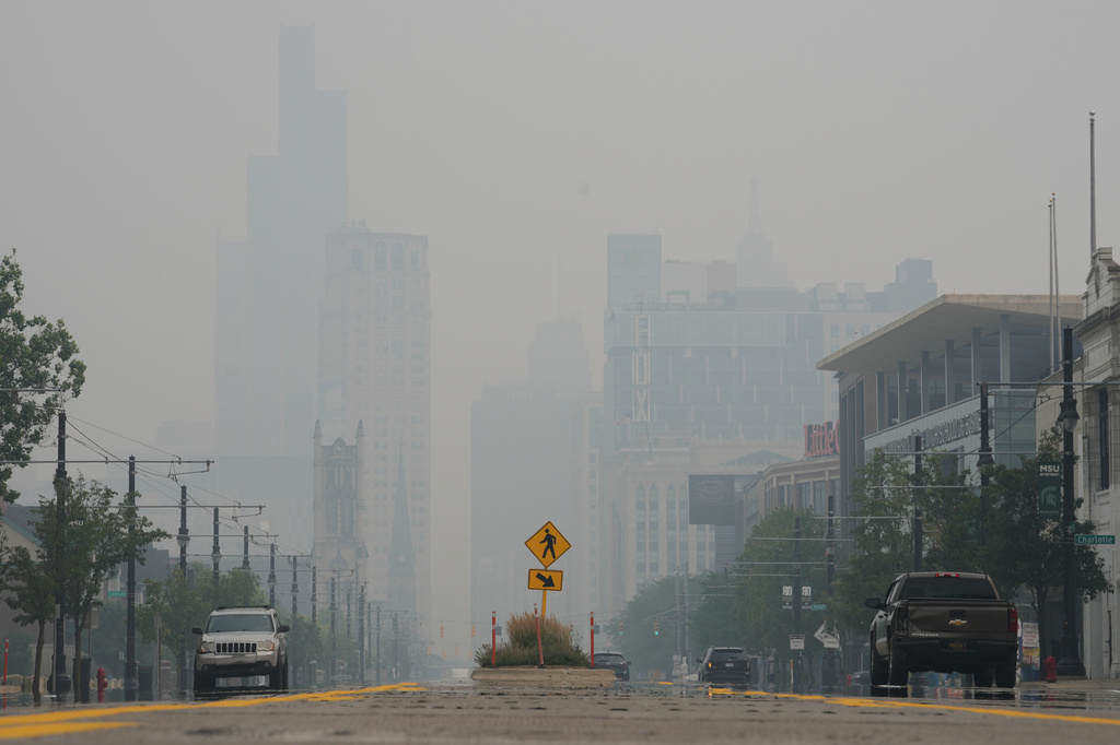 The Detroit city skyline is obscured during poor air quality due to smoke from Canadian wildfires Thursday, July 16, 2026, in Detroit. (AP Photo/Paul Sancya)