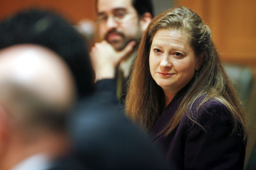 FILE - Assistant Attorney General Maria Lazar attends a court hearing on April 1, 2011 in Dane County Circuit Court in Madison, Wis. (AP Photo/Michael P. King, Pool, File)