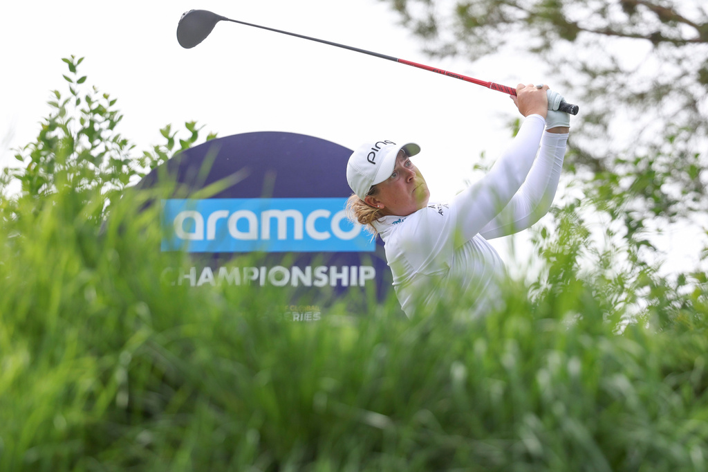 Lauren Coughlin hits a tee shot on the ninth hole during the first round of the Aramco Championship LPGA golf tournament, Thursday, April 2, 2026, in North Las Vegas. (AP Photo/Ian Maule)