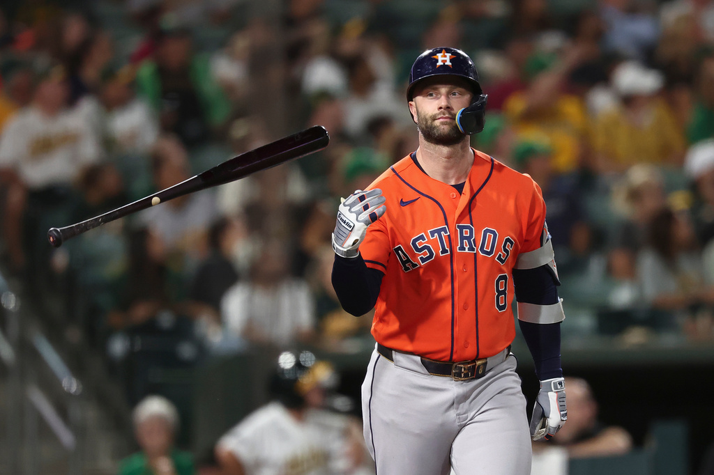 Houston Astros' Christian Walker flips the bat after hitting a home run during the fourth inning of a baseball game against the Athletics, Friday, Sept. 25, 2026, in West Sacramento, Calif. (AP Photo/Sara Nevis)