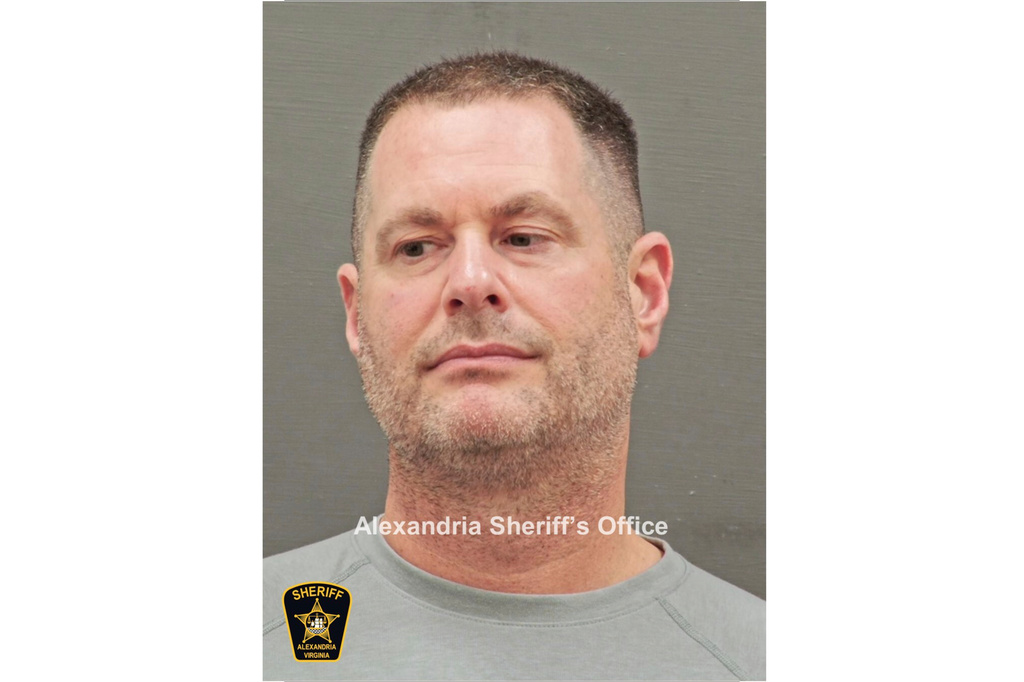 In this image provided and annotated by the Alexandria's Sheriff's Office, David J. Rush is seen in his booking photo in Alexandria, Va. (Alexandria Sheriff via AP)