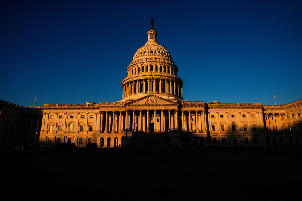 FILE - The U.S. Capitol is seen shortly after sunrise, Dec. 16, 2025, in Washington. (AP Photo/Julia Demaree Nikhinson, File)