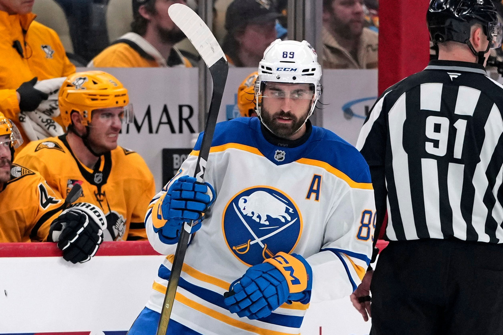 Buffalo Sabres' Alex Tuch (89) returns to the bench after scoring during the second period of an NHL hockey game against the Pittsburgh Penguins in Pittsburgh, Thursday, March 5, 2026. (AP Photo/Gene J. Puskar)