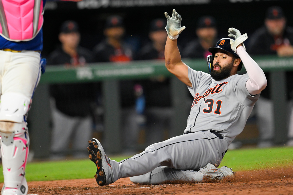 Detroit Tigers' Riley Greene scores on a single hit by teammate Wenceel Perez during the seventh inning of a baseball game against the Kansas City Royals in Kansas City, Mo., Sunday, May 10, 2026. (AP Photo/Reed Hoffmann)