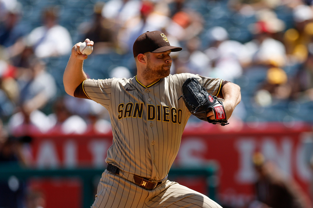 San Diego Padres starting pitcher Michael King delievers during the first inning of a baseball game against the Los Angeles Angels, Sunday, April 19, 2026, in Anaheim, Calif. (AP Photo/Caroline Brehman)