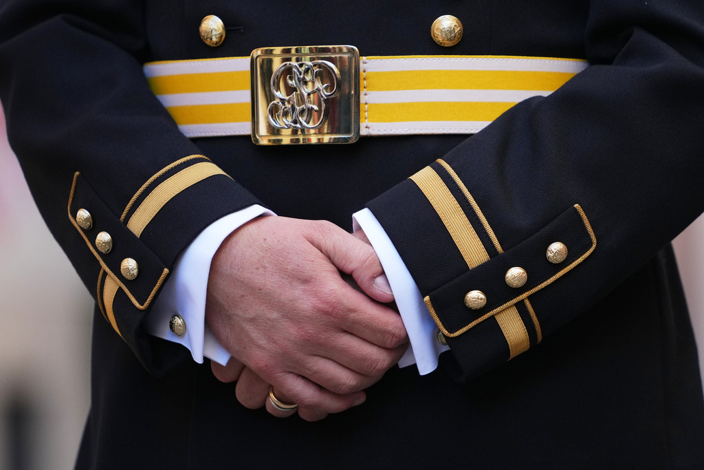 Captain Lorenz Keusch poses for reporters during the presentation of the Swiss Guard Mezza-Gala uniform in the Swiss Guard Barracks at the Vatican, Thursday, Oct. 2, 2025. (AP Photo/Alessandra Tarantino)