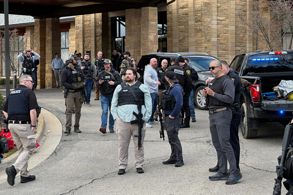 Law enforcement respond to a call at Temple Israel synagogue, Thursday, March 12, 2026 in West Bloomfield Township, Mich. (AP Photo/Corey Williams)
