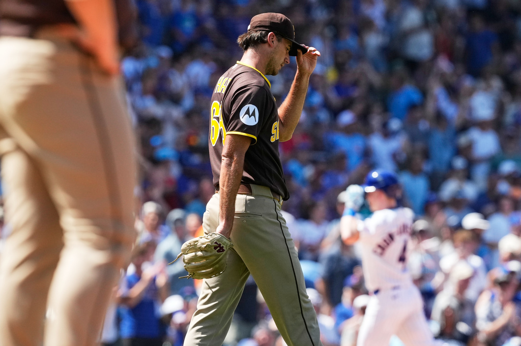 San Diego Padres relief pitcher Kyle Hart reacts after Chicago Cubs' Pete Crow-Armstrong hit a three-run home run during the fifth inning of a baseball game in Chicago, Wednesday, July 1, 2026. (AP Photo/Nam Y. Huh)
