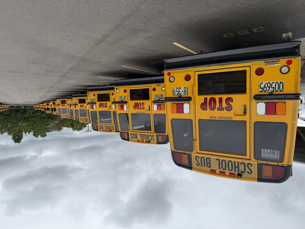 School buses are parked inside the Dayton Public Transportation center on Thursday, August 21, 2025 in Dayton, Ohio. (AP Photo/Patrick Aftoora-Orsagos)