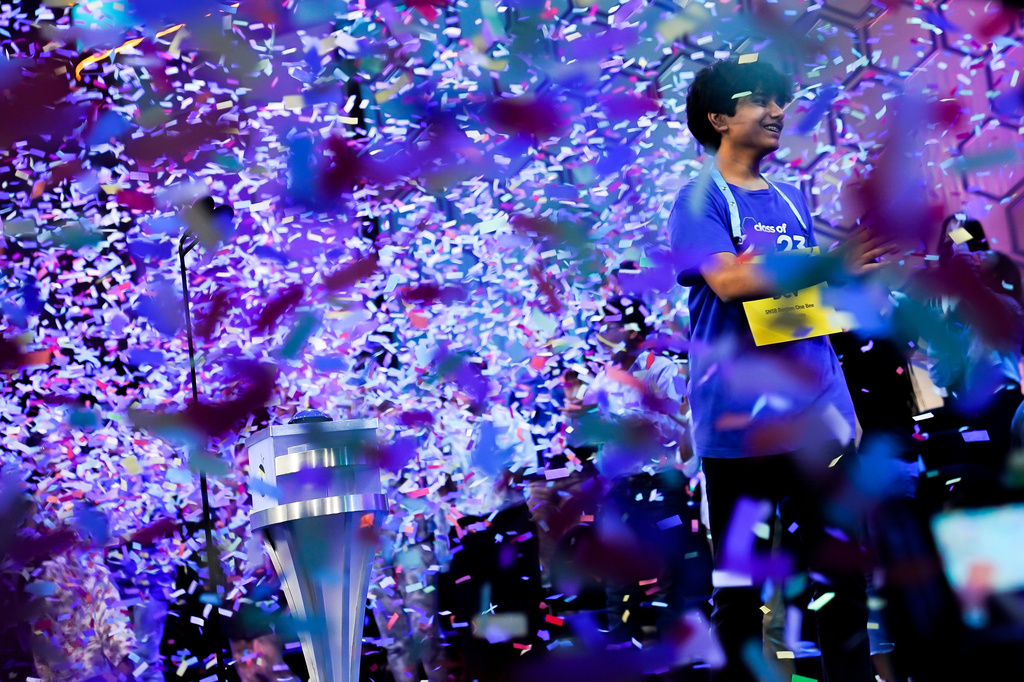 FILE - Dev Shah, from Largo, Fla., reacts to winning the Scripps National Spelling Bee, June 1, 2023, in Oxon Hill, Md. (AP Photo/Nathan Howard, File)