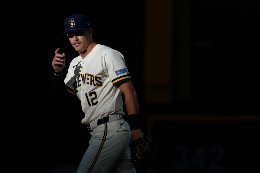 Milwaukee Brewers' Cooper Pratt warms up before the first inning of a baseball game against the Cleveland Guardians, Tuesday, June 16, 2026, in Milwaukee. (AP Photo/Aaron Gash)