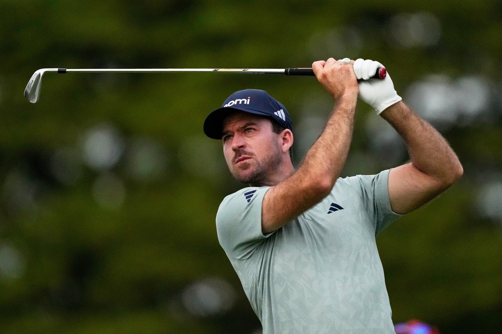Nick Taylor, of Canada, hits from the 11th tee during the first round of the Sony Open golf event at the Waialae Country Club in Honolulu, Thursday, Jan. 15, 2026. (AP Photo/Matt York)