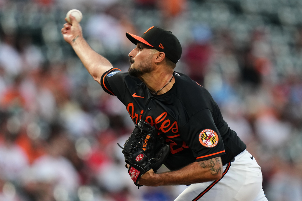 Baltimore Orioles starting pitcher Zach Eflin delivers during the second inning of a baseball game against the Texas Rangers, Tuesday, March 31, 2026, in Baltimore. (AP Photo/Stephanie Scarbrough)
