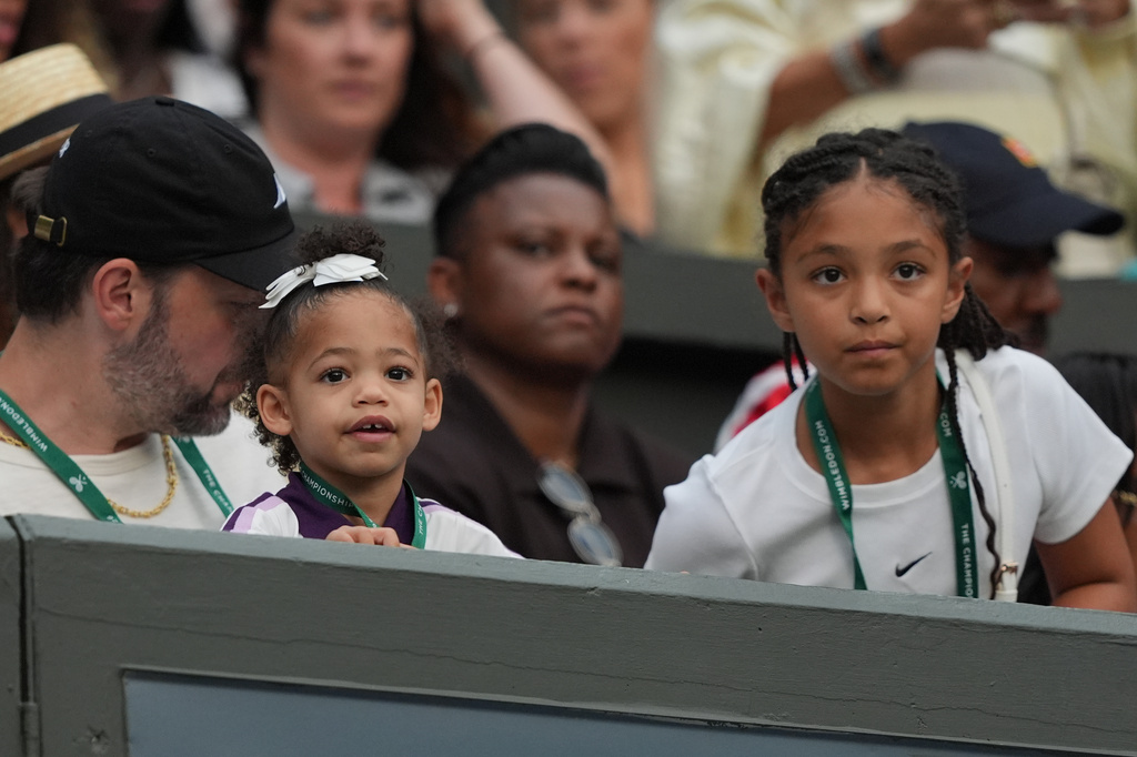 Serena's William husband Alexis Ohanian and their daughters Olympia and Adira watch the first round women's singles match between Serena Williams of the United States and Maya Joint of Australia, at the Wimbledon Tennis Championships in London, Tuesday, June 30, 2026. (AP Photo/Maja Smiejkowska)