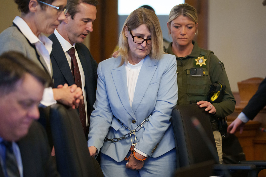 Kristin Ramsey, charged in the killing of a young real estate agent, enters a hearing at the Dallas County courthouse, Friday, April 10, 2026 in Adel, Iowa. (Zach Boyden-Holmes/The Des Moines Register via AP, Pool)