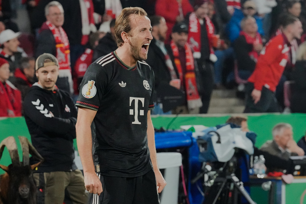 Bayern's Harry Kane celebrates after scoring his side's second goal during the German soccer cup match between Cologne and FC Bayern Munich in Cologne, Wednesday, Oct. 29, 2025. (AP Photo/Martin Meissner)