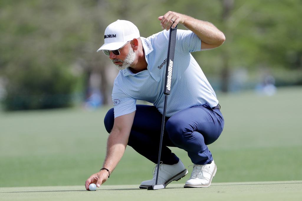 Paul Waring places his ball on the 17th green during the first round of the Texas Children's Houston Open golf tournament Thursday, March 26, 2026, in Houston. (AP Photo/Michael Wyke)