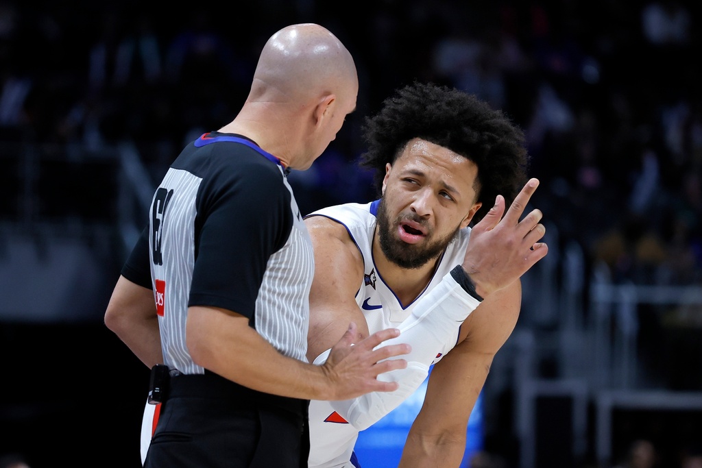 Detroit Pistons guard Cade Cunningham, right, complains to referee Jacyn Goble during the first half of an NBA basketball game against the Boston Celtics Monday, Jan. 19, 2026, in Detroit. (AP Photo/Duane Burleson)
