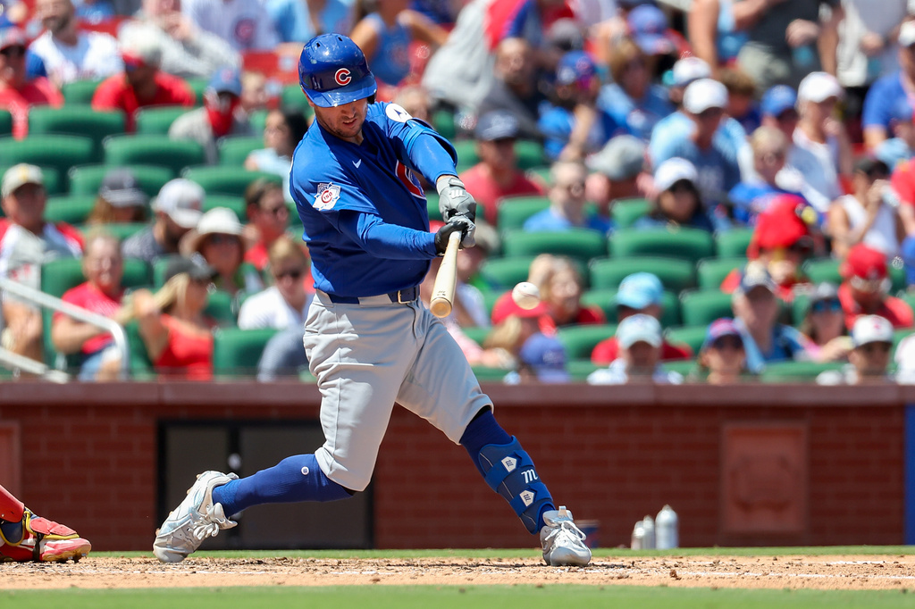 Chicago Cubs' Alex Bregman hits a double during the fourth inning of a baseball game against the St. Louis Cardinals, Thursday, July 30, 2026, in St. Louis. (AP Photo/Scott Kane)