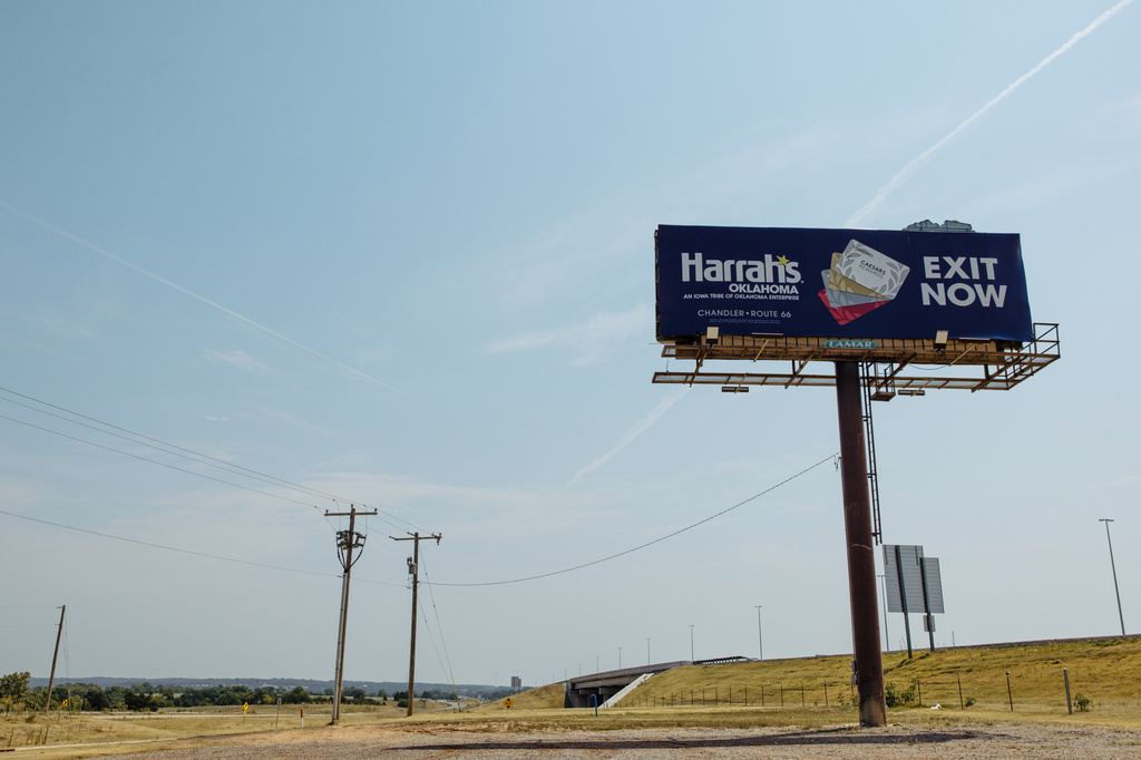 A billboard for Harrah's Casino on Route 66 is seen near Chandler, Okla., Wednesday, Aug. 5, 2026. (AP Photo/Brittany Bendabout)