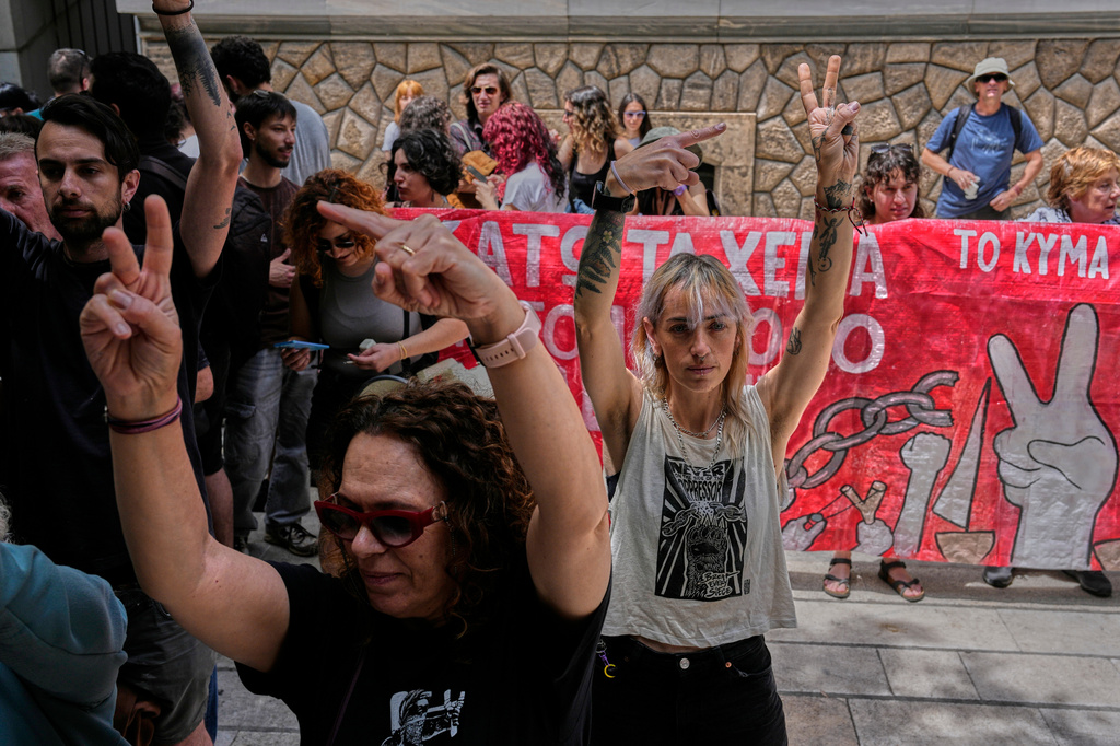Protesters chant pro-Palestinian slogans outside Greece's Foreign Ministry after Israel's navy intercepted an activist flotilla in waters off of Cyprus, in Athens, Tuesday, May 19, 2026. (AP Photo/Thanassis Stavrakis)