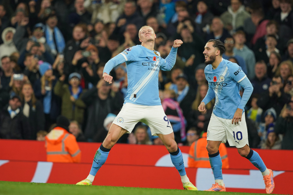 Manchester City's Erling Haaland celebrates after scoring his side's second goal during the English Premier League soccer match between Manchester City and Bournemouth in Manchester, England, Sunday, Nov. 2, 2025. (AP Photo/Ian Hodgson)