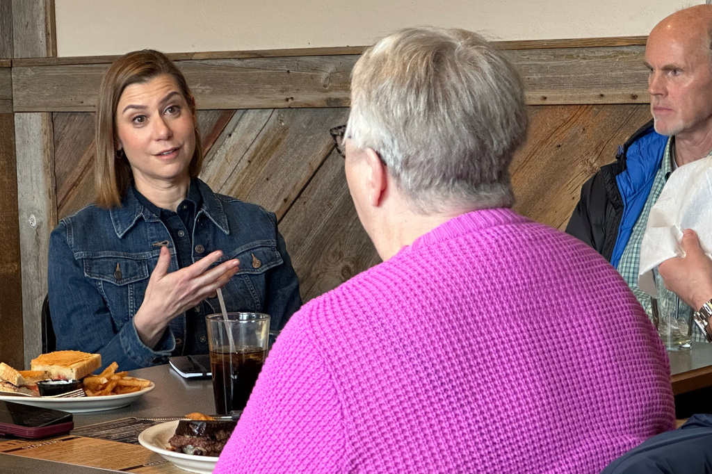 Sen. Elissa Slotkin, D-Mich., speaks to voters in Indianola, Iowa, Tuesday, April 7, 2026. (AP Photo/ Hannah Fingerhut)