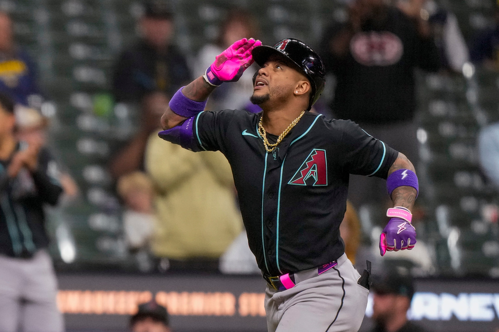 Arizona Diamondbacks' Ketel Marte celebrates as he rounds the bases on a single home run during the ninth inning of a baseball game against the Milwaukee Brewers Wednesday, April 29, 2026, in Milwaukee. (AP Photo/Andy Manis)