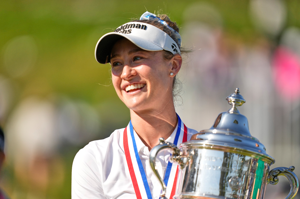Nelly Korda holds the trophy after winning the U.S. Women's Open golf tournament Sunday, June 7, 2026, in the Pacific Palisades area of Los Angeles. (AP Photo/Ashley Landis)