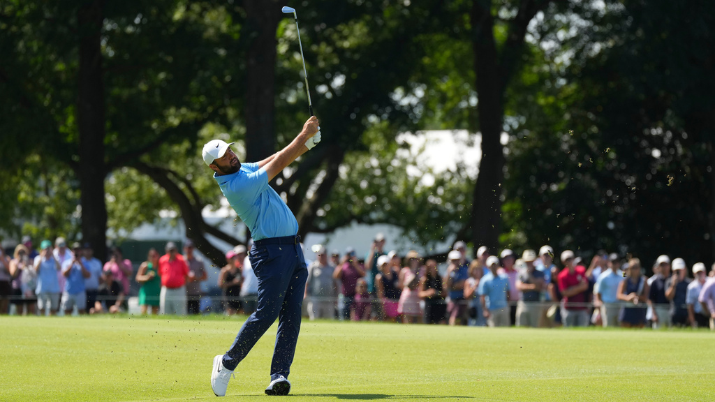 Scottie Scheffler hits from the first fairway in the final round of the BMW Championship golf tournament, Sunday, Aug. 23, 2026, in St. Louis. (AP Photo/Jeff Roberson)