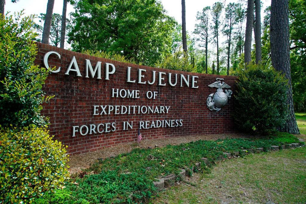FILE - The main gate to Camp Lejeune Marine Base is seen outside Jacksonville, N.C., April 29, 2022. (AP Photo/Allen G. Breed, File)