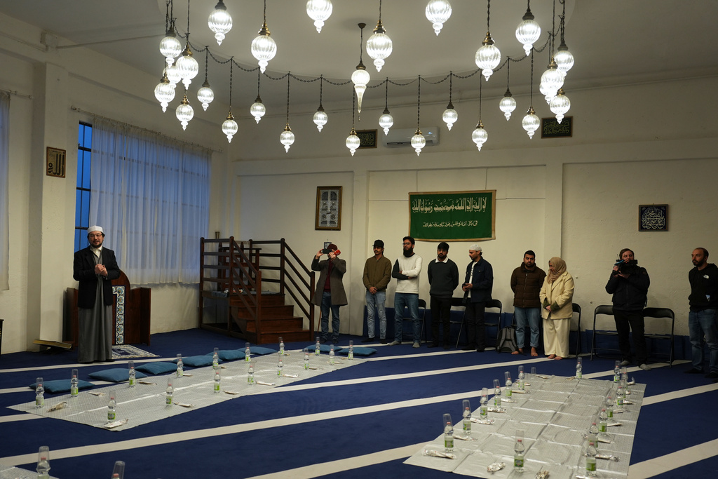 Imam Yahya Pallavicini, vice president of the Italian Islamic Religious Community, speaks at the Al-Wahid mosque during Ramadan in Milan, Italy, Friday, Feb. 20, 2026, as the city hosts the Winter Olympics. (AP Photo/María Teresa Hernández)