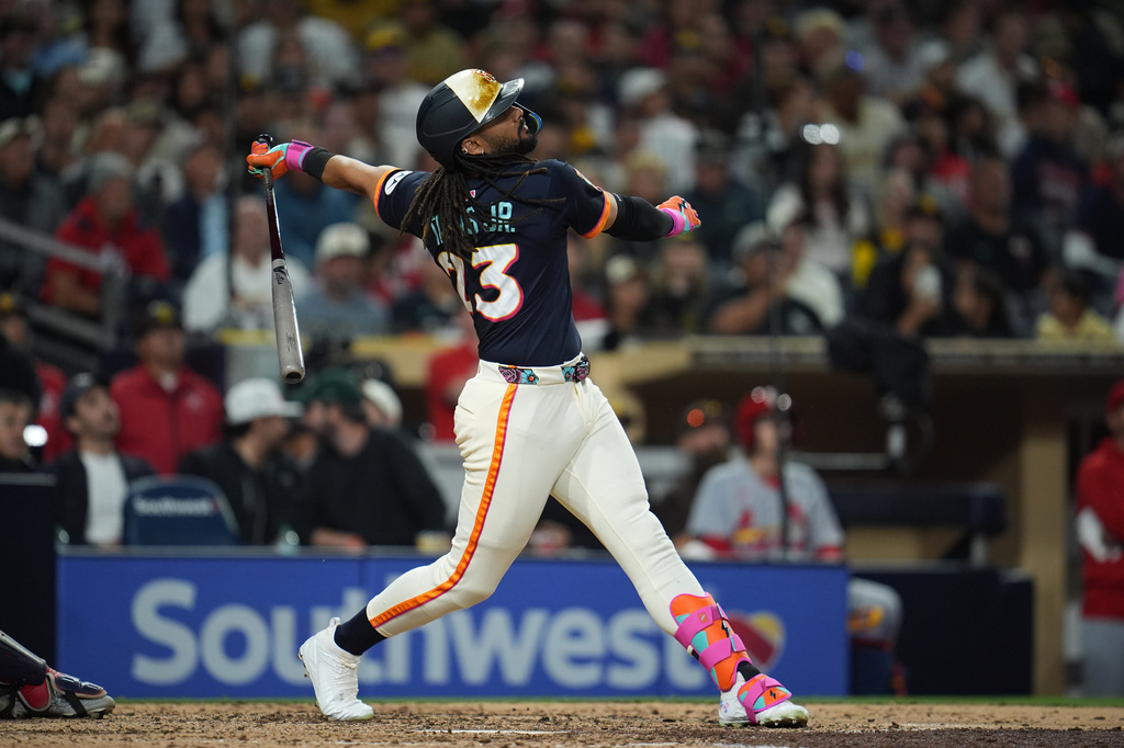 San Diego Padres' Fernando Tatis Jr. reacts after flying out during the seventh inning of a baseball game against the St. Louis Cardinals Friday, May 8, 2026, in San Diego. (AP Photo/Gregory Bull)