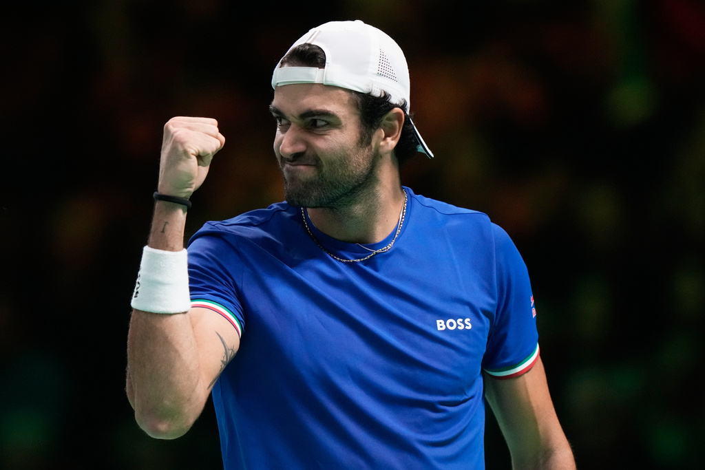 Italy's Matteo Berrettini reacts after winning a point to Belgium's Raphael Collignon during a Davis Cup semifinal singles tennis match between Italy and Belgium, in Bologna, Italy, Friday, Nov. 21, 2025. (AP Photo/Luca Bruno)
