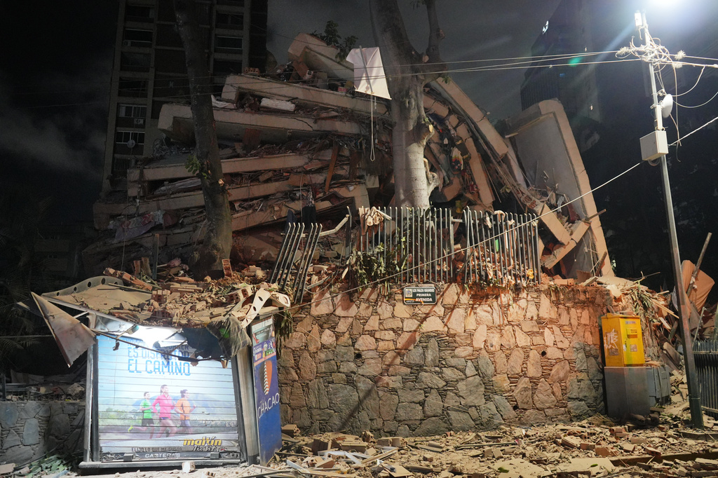 A collapsed building after an earthquake in Caracas, Venezuela, Wednesday, June 24, 2026. (AP Photo/Adrian Naranjo)