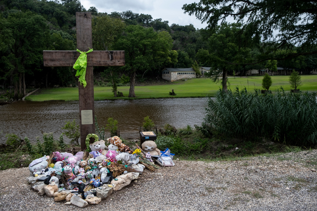 FILE - A memorial for the victims of the 2025 Camp Mystic flood stands, July 17, 2026, in Hunt, Texas. (AP Photo/Joel Angel Juarez, File)