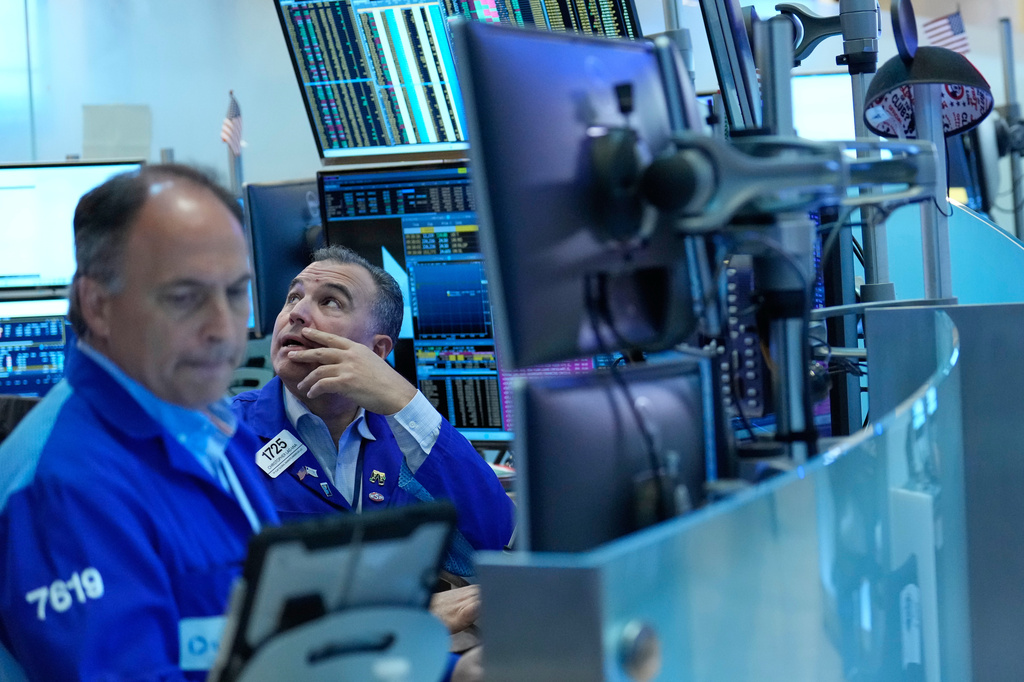 Christopher Lagana works on the floor at the New York Stock Exchange in New York, Monday, Sept. 14, 2026. (AP Photo/Seth Wenig)