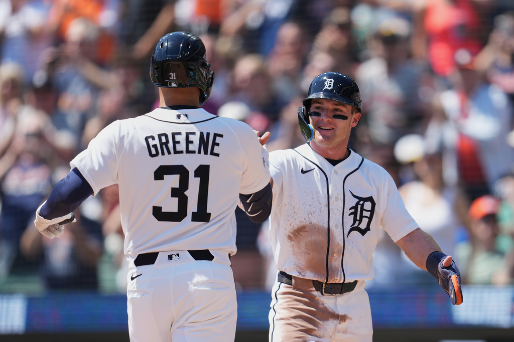 Detroit Tigers' Riley Greene (31) celebrates his two-run home run with Kevin McGonigle, right, against the Milwaukee Brewers during the first inning of a baseball game Thursday, April 23, 2026, in Detroit. (AP Photo/Paul Sancya)