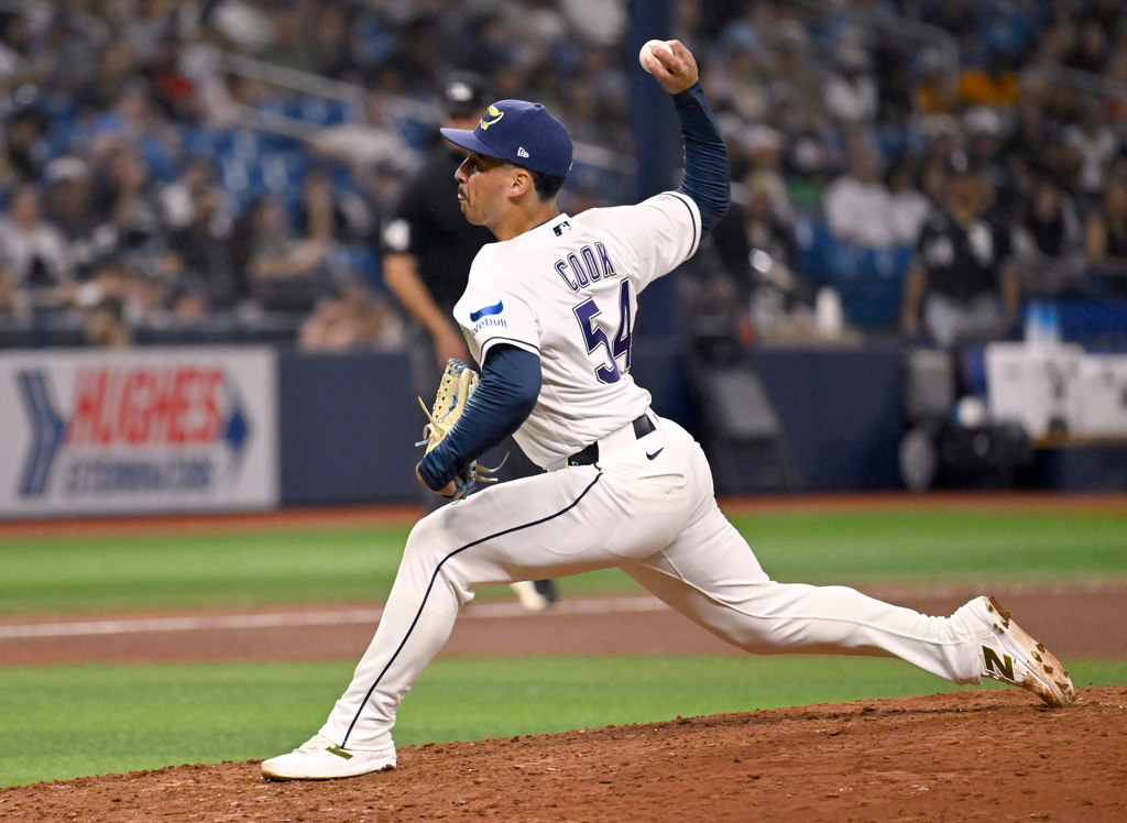 Tampa Bay Rays pitcher Alex Cook throws during the seventh inning of a baseball game against the Chicago White Sox, Friday, July 31, 2026, in St. Petersburg, Fla. (AP Photo/Jason Behnken)