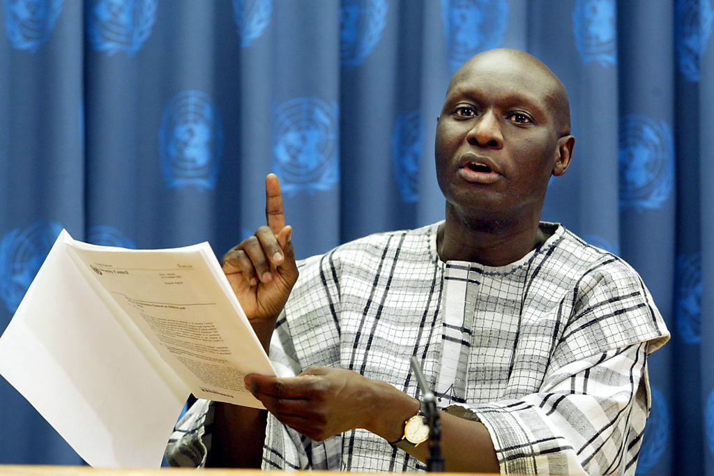 FILE - Olara Otunnu, the United Nations special representative for children and armed conflict, briefs reporters on Dec. 16, 2002, at the United Nations. (AP Photo/David Karp, File)