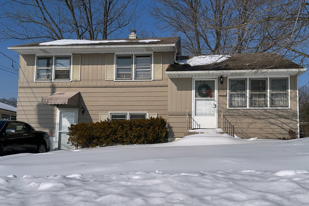 The home of William Stevenson, the ex-husband of former first lady Jill Biden, is shown in Wilmington, Del., Tuesday, Feb. 3, 2026. Stevenson has been charged in the killing his current wife at the home. (AP Photo/Mingson Lau)