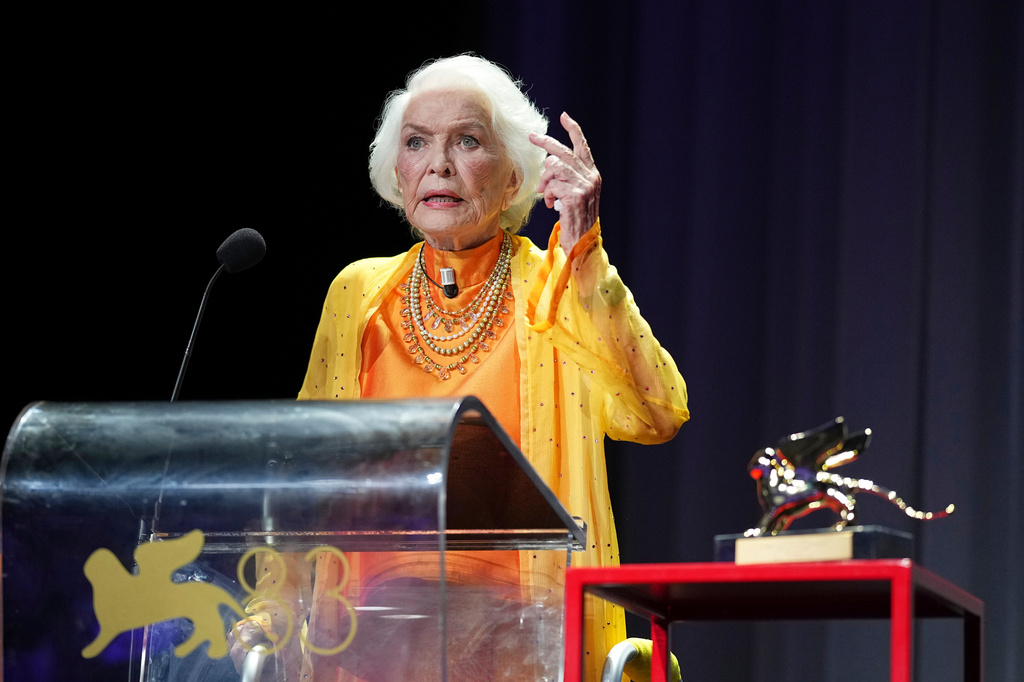 Ellen Burstyn speaks to the audience after receiving the golden lion for lifetime achievement during the 83rd edition of the Venice Film Festival in Venice, Italy, on Monday, Sept. 7, 2026. (Photo by Scott A Garfitt/Invision/AP)