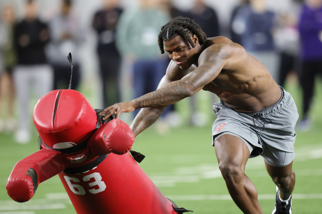 Ohio State linebacker Arvell Reese participates in a drill during the school's NFL football Pro Day in Columbus, Ohio, Wednesday, March 25, 2026. (AP Photo/Paul Vernon)