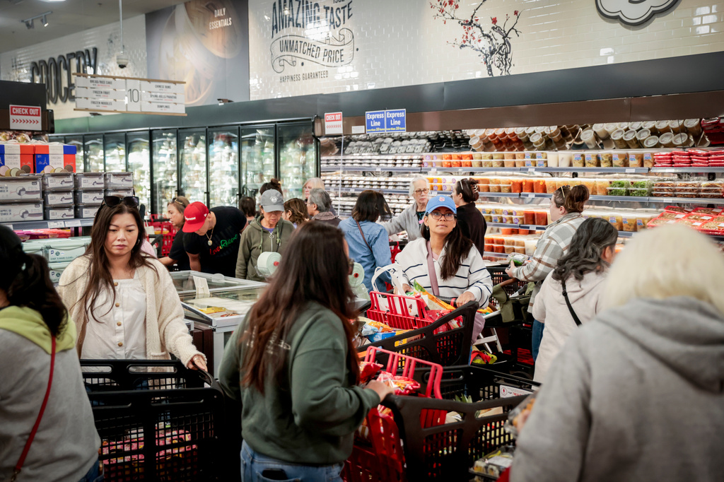 Shoppers navigate packed aisles in the new H Mart, in Dublin, Calif., Thursday, March 26, 2026. (Brontë Wittpenn/San Francisco Chronicle via AP)