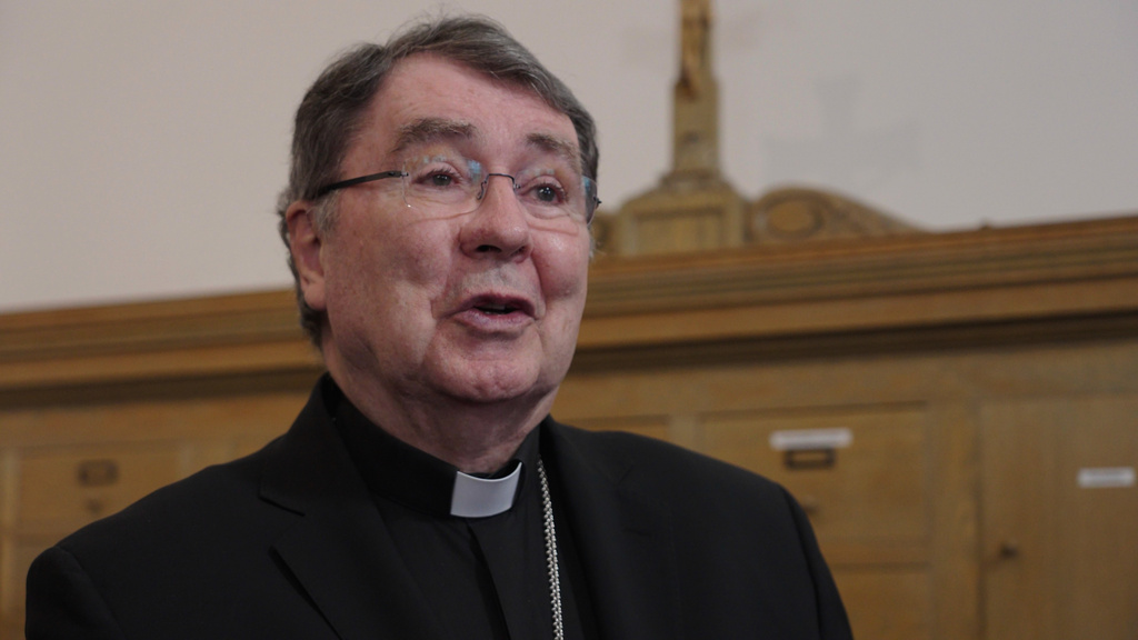 Cardinal Christophe Pierre speaks to reporters after a mass in solidarity with migrants at the Chapel of St. Thomas Aquinas on Friday, Feb. 27, 2026 in St. Paul, Minn. (AP Photo/Mark Vancleave)