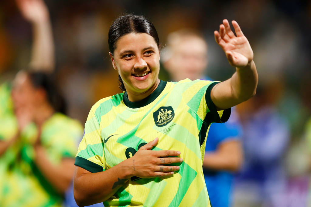 FILE - Australia's Sam Kerr waves following the Women's Asian Cup quarterfinal soccer match between Australia and North Korea in Perth, Australia, March 13, 2026. (AP Photo/Gary Day, File)