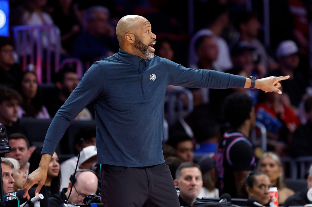 Orlando Magic head coach Jamahl Mosley reacts during the first half of an NBA basketball game against the Miami Heat in Miami, Saturday, March 14, 2026. (AP Photo/Rhona Wise)