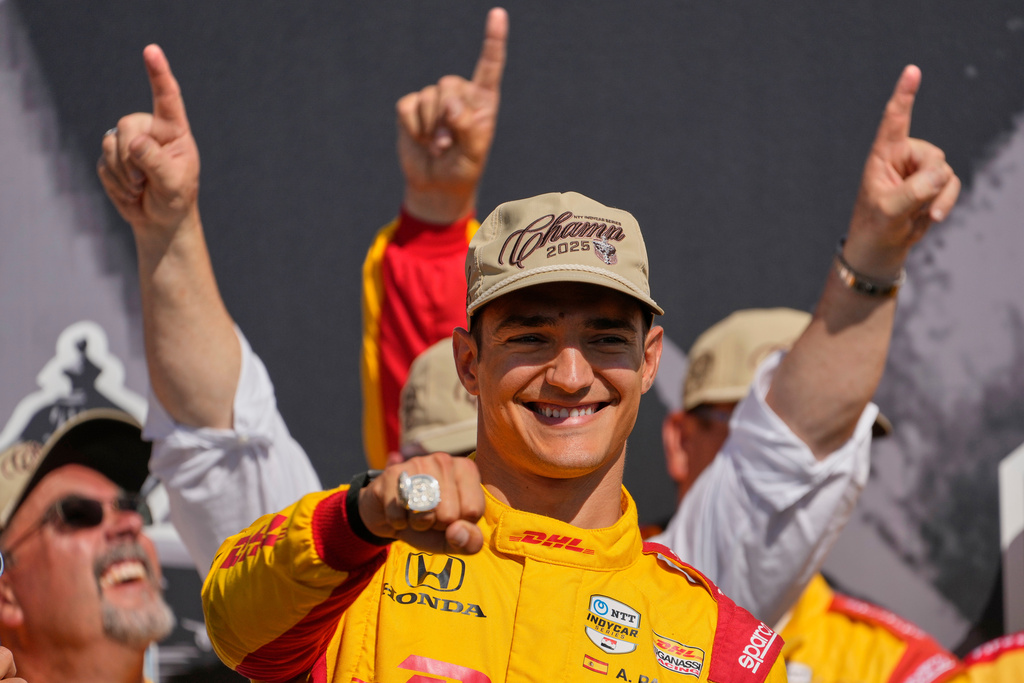 FILE - Alex Palou celebrates after winning the IndyCar championship Sunday, Aug. 31, 2025, at Nashville Superspeedway in Lebanon, Tenn. (AP Photo/George Walker IV, file)